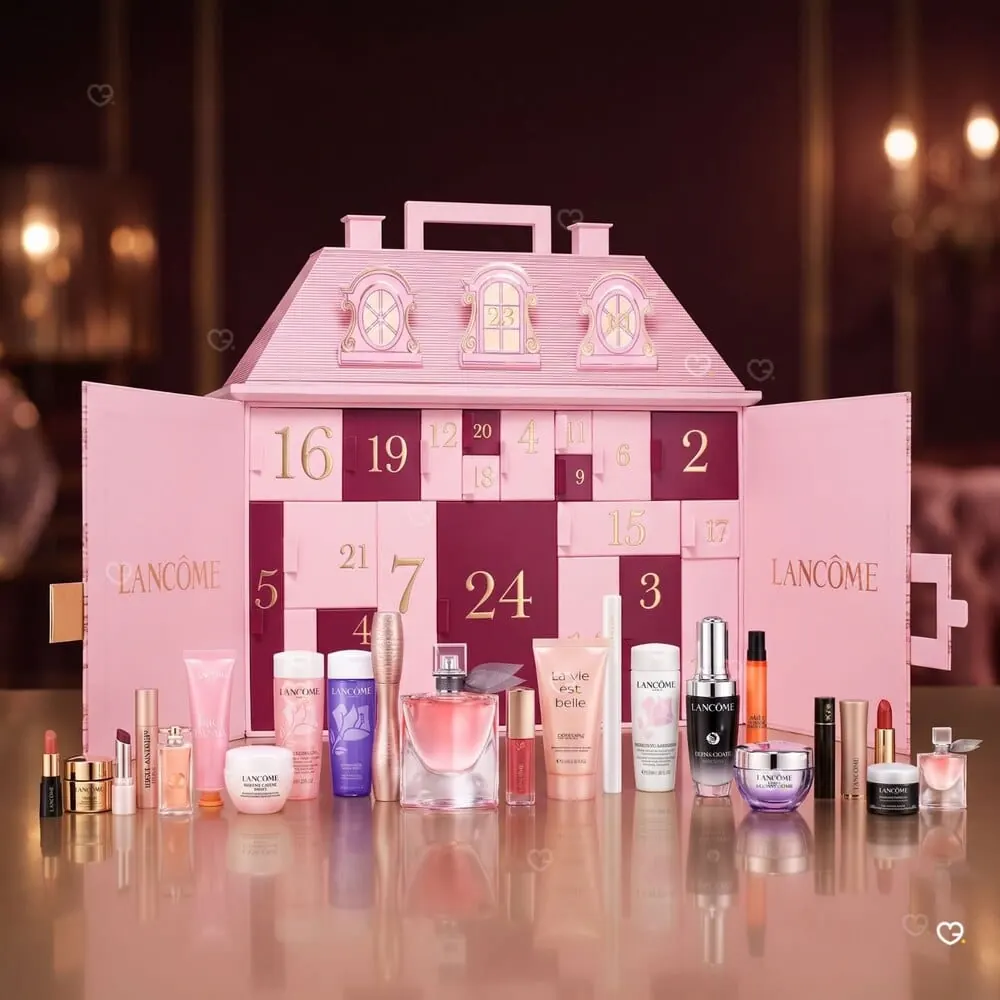 Les 24 produits Lancôme alignés devant le coffret ouvert